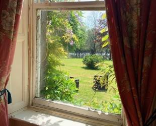 Double room with four posted bed, ensuite bathroom and amazing views
